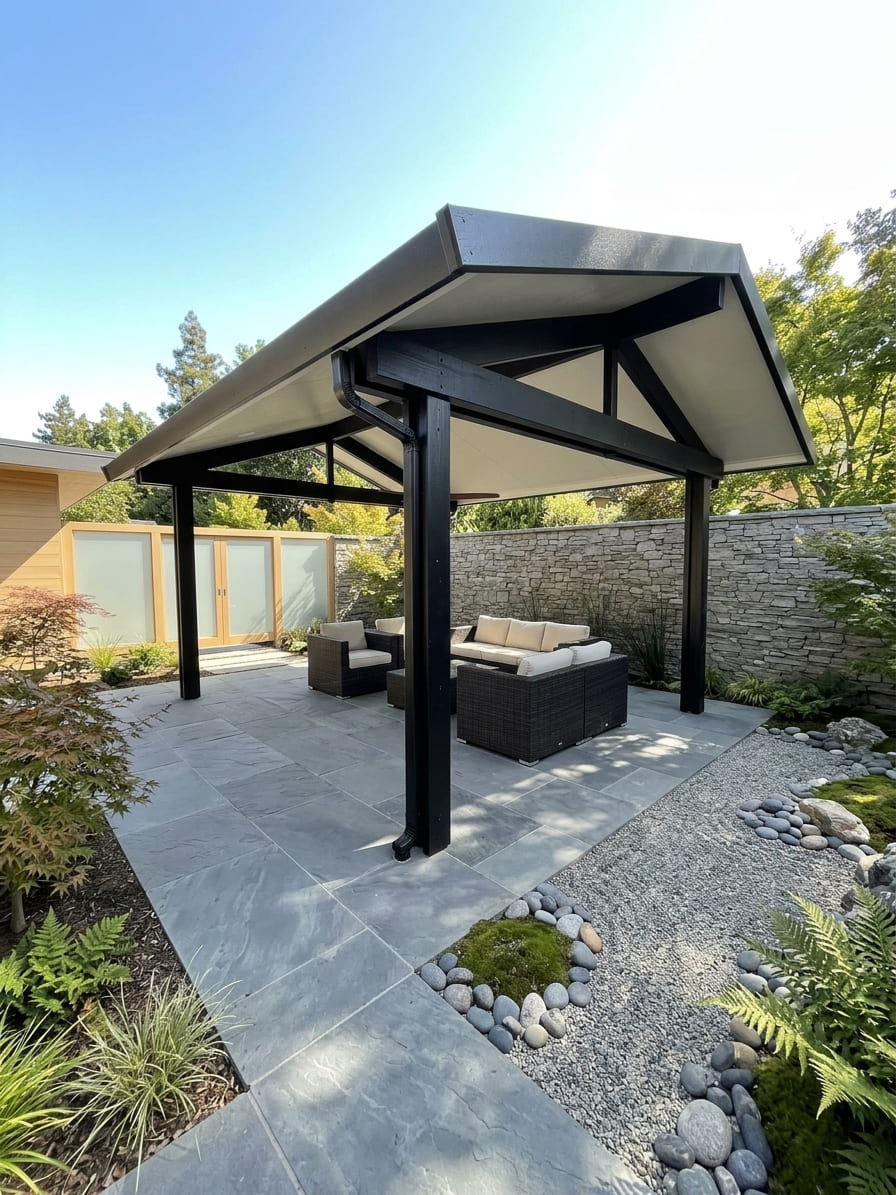 Custom two-tone cathedral gable roof solid insulated patio cover with dark bronze aluminum beams and woodgrain embossed trim installed poolside over stamped concrete in Elk Grove, CA.